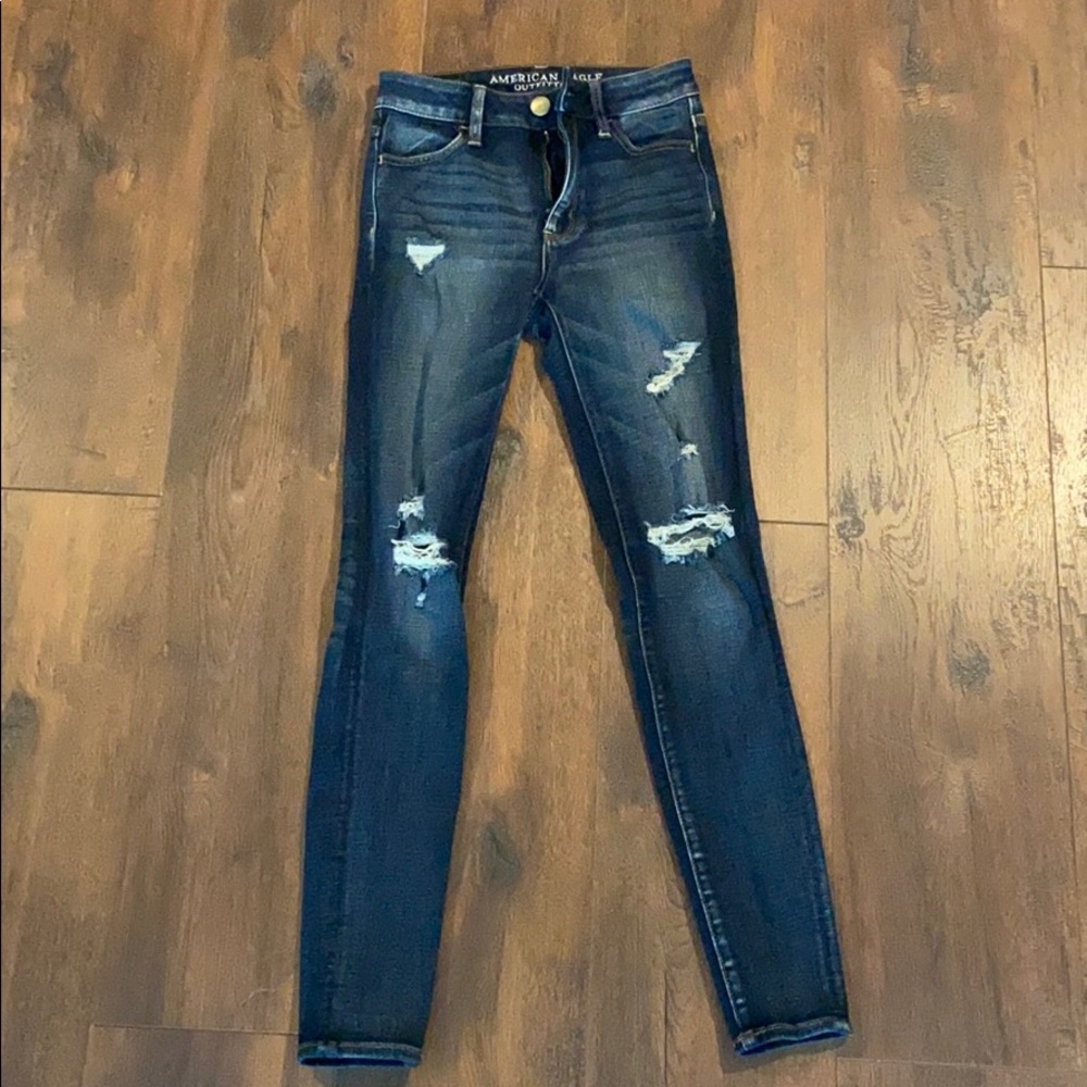 Distressed hi-rise skinny jeans